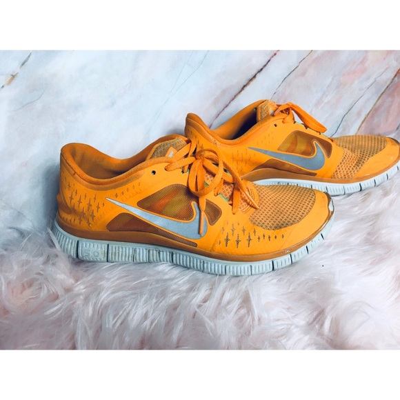 orange tennis shoes nike
